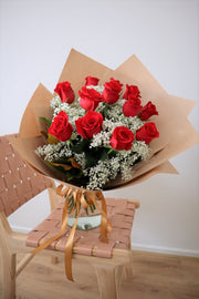 A bouquet of red roses waiting for delivery on Valentine's Day in the Adelaide Hills