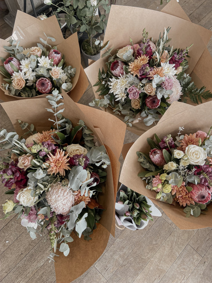 Native flowers and a seasonal mix of blooms that are waiting to be delivered by a florist in the adelaide hills